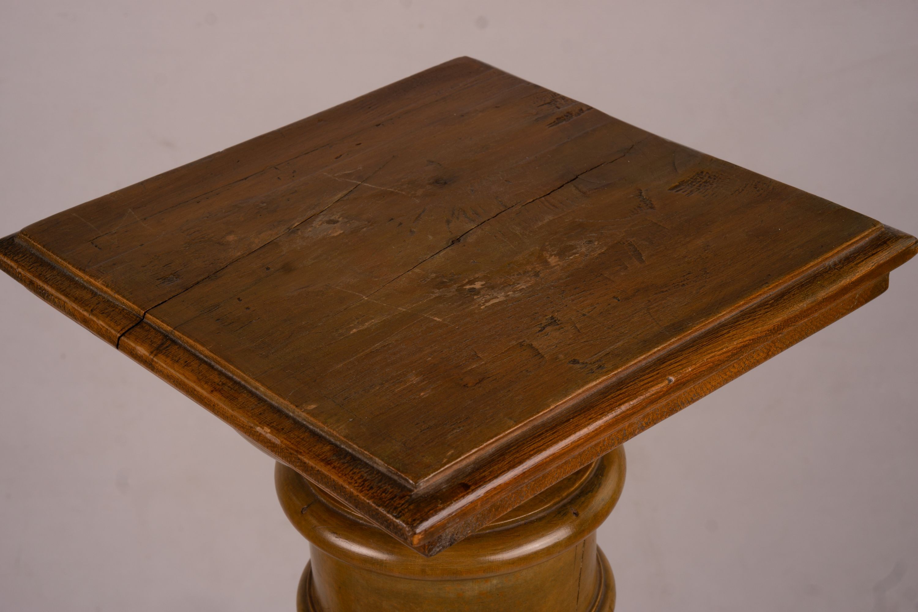 A pair of Victorian style carved beech and walnut pedestals, height 110cm